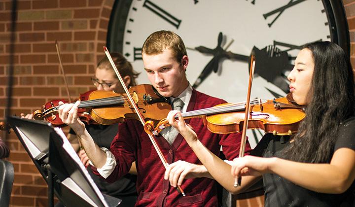 Students playing instruments at WLC Christmas